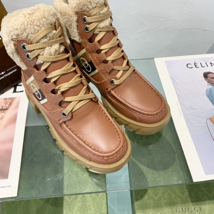 G*u*i boots